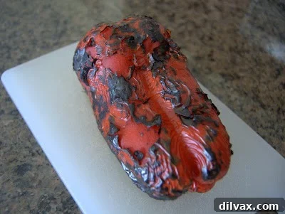 Fully charred red pepper after roasting