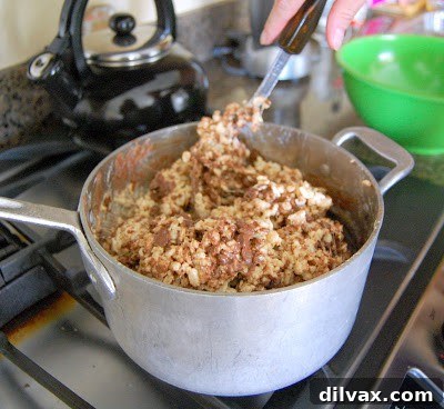 Chocolate chips melting into the Rice Krispies mixture