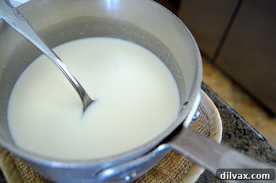 Nanner Butter Bliss Ice Cream 3 Close-up of Banana Cookie Butter Ice Cream in a bowl with a spoon
