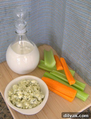 A vibrant salad featuring crisp greens, cherry tomatoes, and a generous drizzle of homemade blue cheese dressing.
