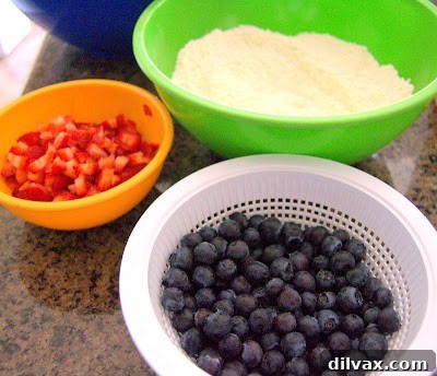 Beautifully stacked buttermilk fruit pancakes with berries, ready to be served.