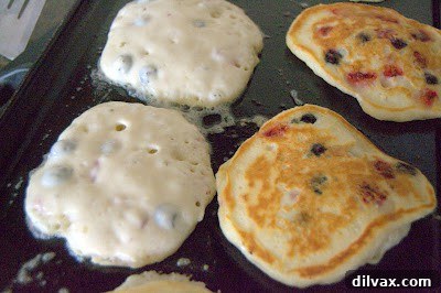 A close-up shot of the buttermilk fruit pancakes, showcasing the berries.
