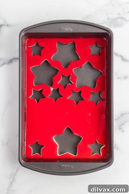 Stars cut out of three layers of Jell-O, ready to serve.