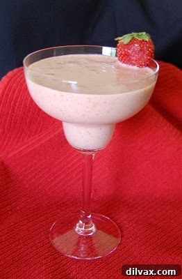 A person smiling and looking happy, conveying warmth and welcome