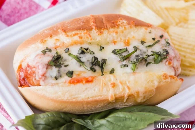 No-Fuss Meatball Sub Perfection 2 Easy Meatball Sub Sandwiches with melted cheese and fresh basil