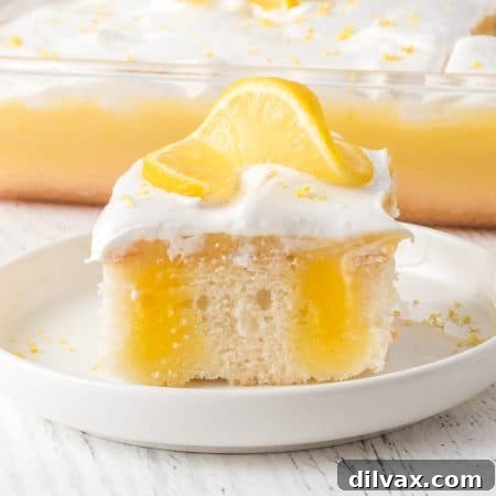 Lemon Poke Cake with Marshmallow Frosting.
