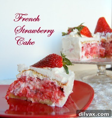 Beautifully baked French Strawberry Cake, showcasing its elegant layers and fresh strawberry garnish.