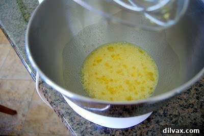 A freshly baked genoise cake, golden brown and perfectly risen.