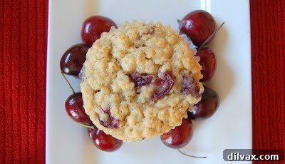 Juicy Cherry & Hearty Oat Muffins 3 Close-up of a bowl of fresh, pitted cherries, ready to be added to the muffin batter.