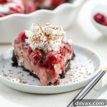 A slice of Cherry Hot Chocolate Cheesecake