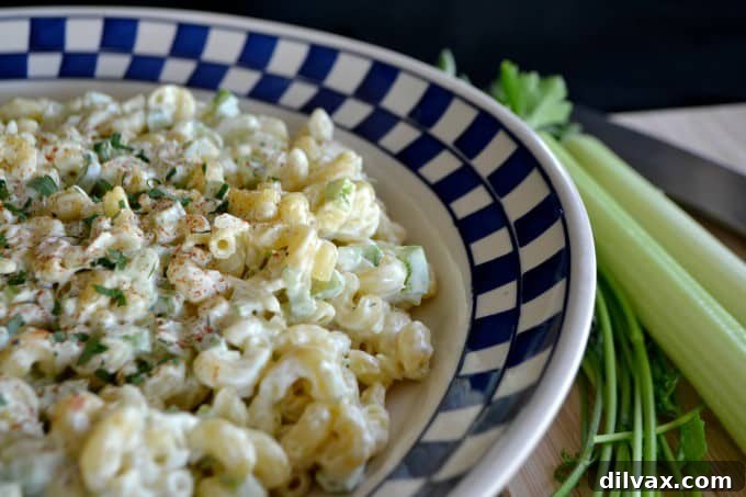 Your basic, yet delicious macaroni salad that is sure to be a hit at summer BBQ's!