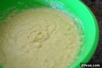 Combining wet and dry ingredients for banana bread