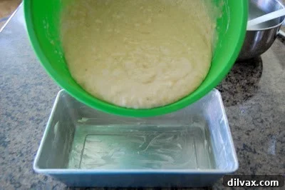Banana bread batter in loaf pan