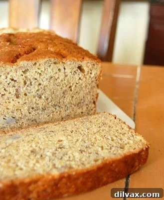 Freshly baked banana bread cooling on a rack