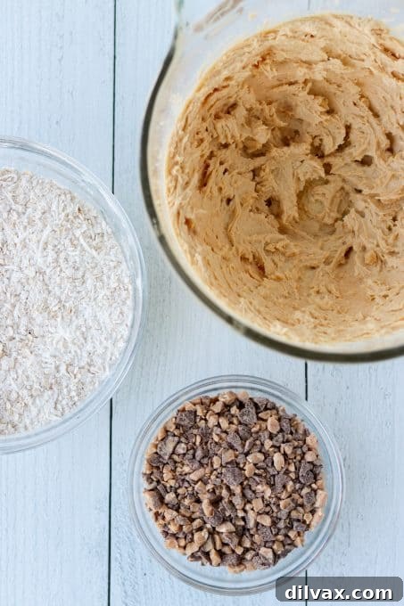 Chewy Toffee Coconut Oat Squares 5 Oatmeal and coconut, toffee chips and batter.