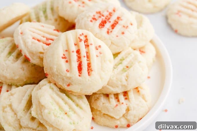 A plateful of cookies with festive sprinkles.