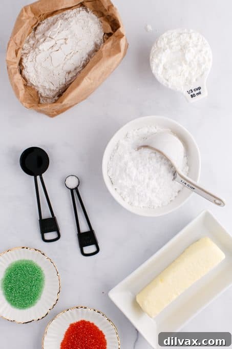 A batch of golden whipped shortbread cookies.