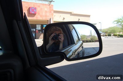 Car at a gas station, ready for a road trip to Tonto Natural Bridge State Park in Arizona.