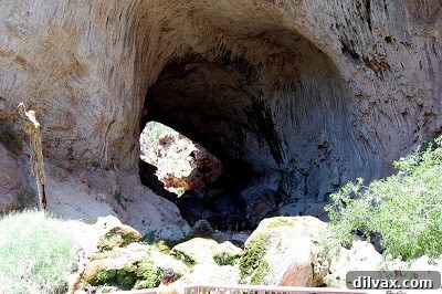 View of the Tonto Natural Bridge from the entrance, inviting visitors to explore inside.
