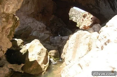 View from inside Tonto Natural Bridge, showing the slippery rock formations.