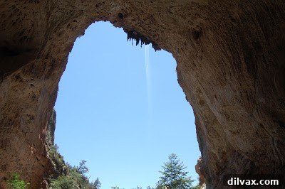 Looking up from under the Tonto Natural Bridge, showing water dripping from the ceiling.