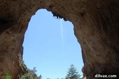 Looking up from under Tonto Natural Bridge, showing water dripping from the ceiling.