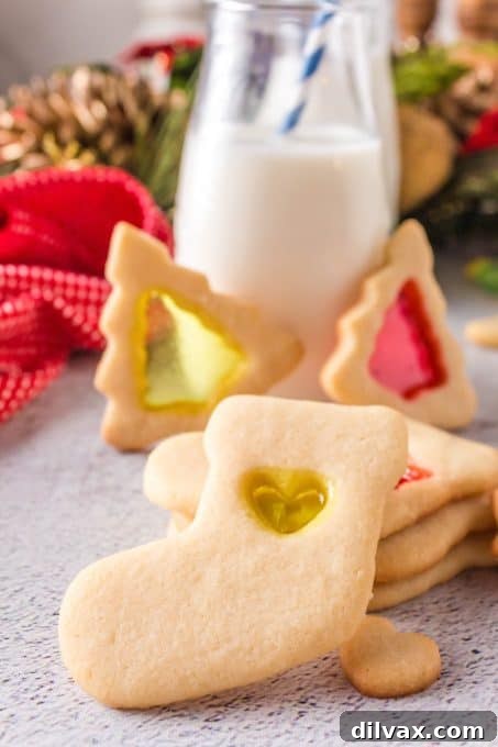 Our 12 Sweetest Days of 2021 13 Mesmerizing Stained Glass Cookies, glowing with melted Jolly Rancher candies.