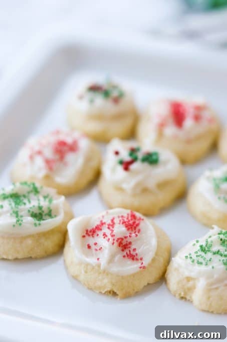 Our 12 Sweetest Days of 2021 14 Delicate Cream Cheese Meltaway Cookies, topped with smooth frosting.
