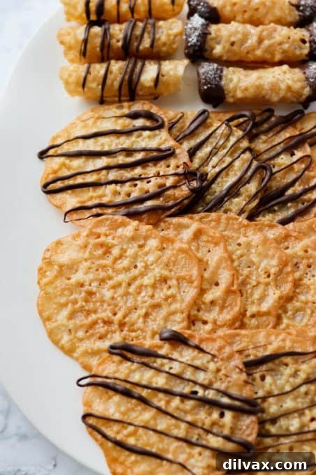 Our 12 Sweetest Days of 2021 7 Elegant Lace Cookies, some drizzled and dipped in rich chocolate for extra indulgence.