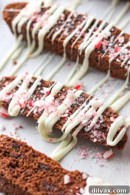 Decadent Peppermint Chocolate Biscotti 6 Chocolate biscotti drizzled in white chocolate and sprinkled with crushed candy canes.