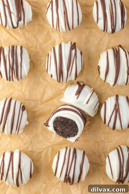 Oreo Truffles 6 A finished Oreo dessert truffle, perfectly coated in white chocolate.
