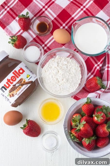 Decadent Strawberry Nutella Crepes 4 Ingredients for crepes filled with Nutella and strawberries.