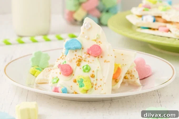 Rainbow Magic Bark 2 Colorful white chocolate bark with Lucky Charms marshmallows and sprinkles.