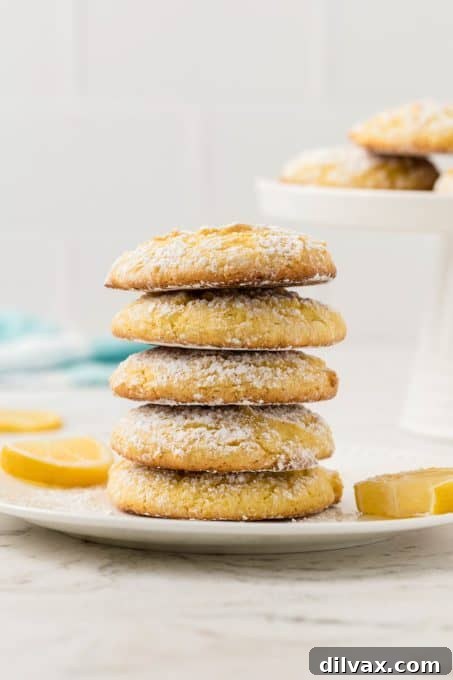 Sunshine Lemon Cookies 5 A stack of cake mix cookies made with lemon.