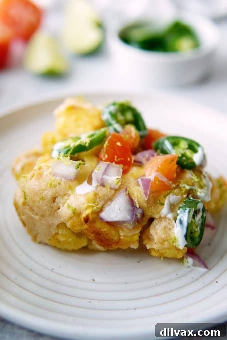 Loaded Tot Nachos 6 Totchos with homemade queso and all the fixin's.