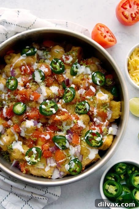 Loaded Tot Nachos 7 Totchos with homemade queso and toppings.