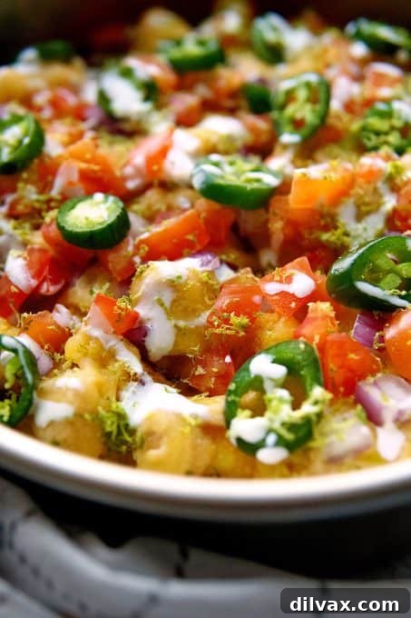 Loaded Tot Nachos 8 Totchos with homemade queso and all the fixin's.