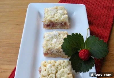 Sliced Hungarian Shortbread showing the golden crust and fruit preserve layer.