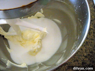 Sliced shortbread showing the layers of crust and strawberry preserves