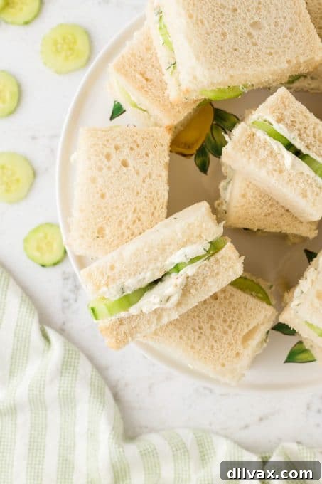 Elegant Cucumber Bites 6 Perfectly layered cucumber and cream cheese sandwiches