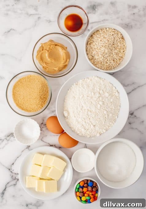 Ultimate Peanut Butter Oatmeal M&M Cookies 4 Ingredients for oatmeal cookies with peanut butter and M&M's.