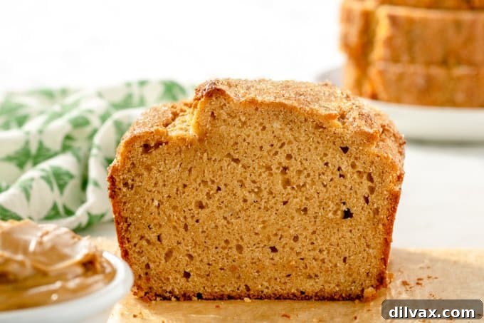 Golden Peanut Butter Quick Bread 2 A beautifully baked loaf of moist peanut butter quick bread, sliced and ready to serve.