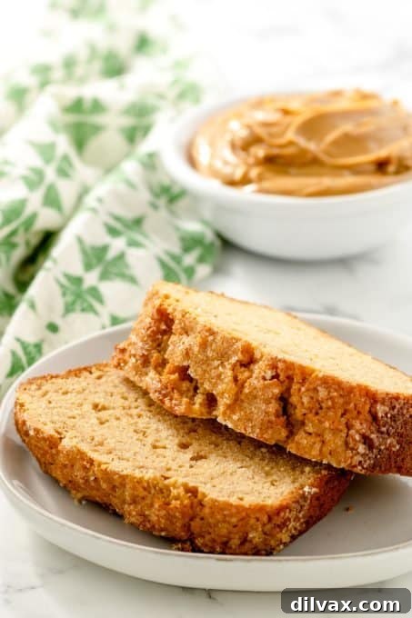 Golden Peanut Butter Quick Bread 8 Two enticing slices of homemade peanut butter quick bread, showcasing its perfectly baked texture.