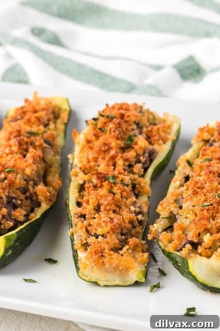 Hearty Mushroom Onion Zucchini Bake 7 Zucchini stuffed with mushrooms and onions and topped with a panko bread crumbs, baked to golden perfection.