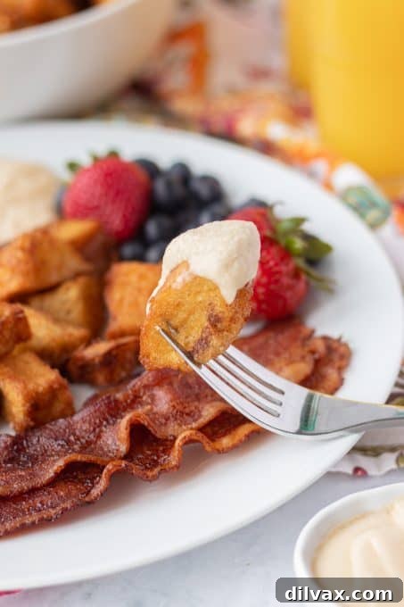 Decadent French Toast Dip 3 Fondue pot on a table with French toast ingredients