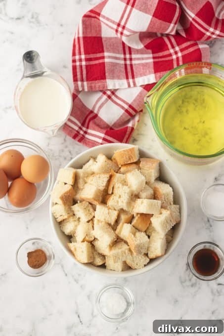 Decadent French Toast Dip 4 Close-up of bread cubes and raw sausage on fondue forks