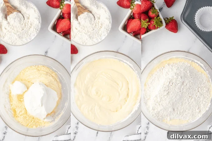 Close-up of baked strawberry muffins cooling on a wire rack.