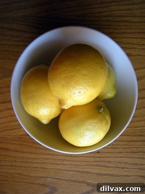 Freshly cooked crepes stacked on a plate, ready for assembly.
