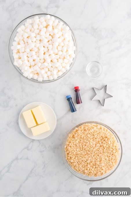 Ingredients for red, white, and blue Rice Krispie Treats, including butter, marshmallows, cereal, vanilla, and food coloring.