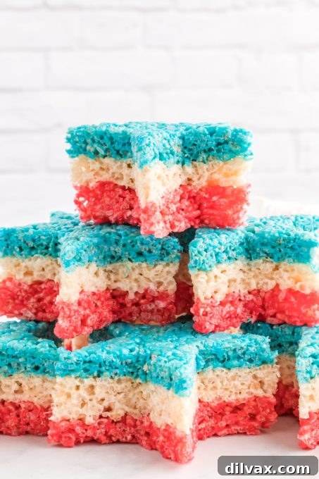 Red, white, and blue Rice Krispies Treat Stars on a plate, ready to be served.